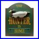 BIG-SKY-CARVERS-The-Duck-Hunter-Is-Home-Hunting-3D-Duck-Decoy-WOOD-SIGN-19x16-01-kwkg