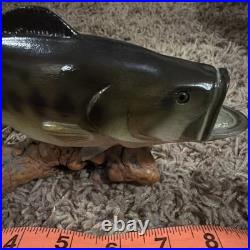 Big Sky Carvers Bass B. Reel, Burl Wood With Bass On Top. 8.5 L X 4.5 T X 2W