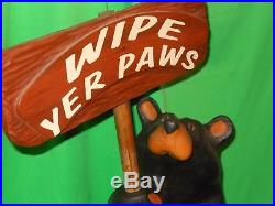 Big Sky Carvers/Jeff Fleming Solid Wood Bear Roy with Wipe Yer Paws Sign