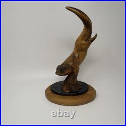 Big Sky Carvers Master's Edition Wooden Diving Otter By BJ Williams (Broken Paw)