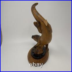 Big Sky Carvers Master's Edition Wooden Diving Otter By BJ Williams (Broken Paw)