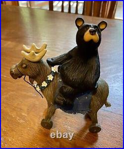 Big Sky Carvers bear riding reindeer