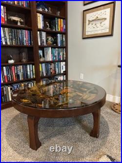 Big Sky Carvers hand carved trout table. Designed by William Herrick