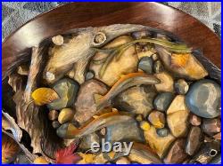 Big Sky Carvers hand carved trout table. Designed by William Herrick