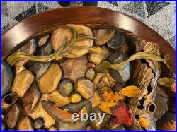 Big Sky Carvers hand carved trout table. Designed by William Herrick