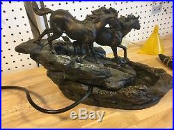 Big sky carvers River Runners Wild Horses fountain water feature