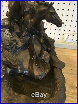 Big sky carvers River Runners Wild Horses fountain water feature