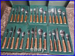 New 6 place set Big Sky Carvers faux antler stainless flatware