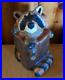 Vintage-Big-Sky-Carvers-Jeff-Fleming-Pine-Wood-Carved-Raccoon-in-Stump-01-ej