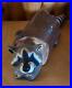 Vintage-Big-Sky-Carves-Jeff-Fleming-Pine-Wood-Carved-Raccoon-in-a-Log-Sculpture-01-cys